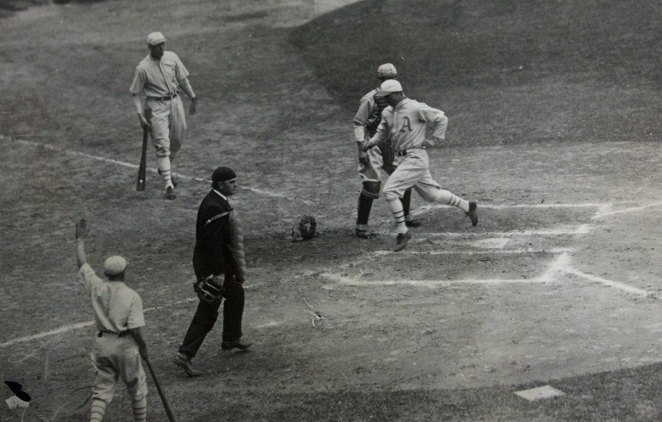 Shibe Park, Philadelphia, Oct 1, 1930 - Jimmie Foxx scores giving A's a 1-0 lead with the first run of the 1930 World Series vs St Louis Cardinals. The A's would score